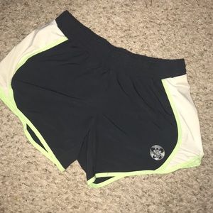 Black and green athletic shorts